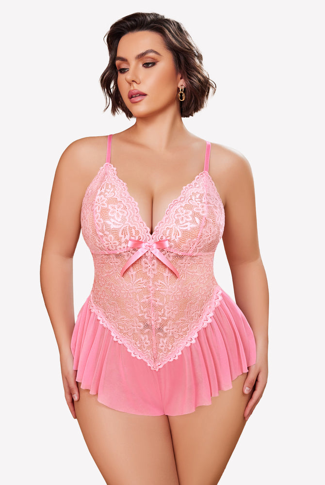 Pink plus size lace bodysuit with adjustable straps and ruffle skirt on model