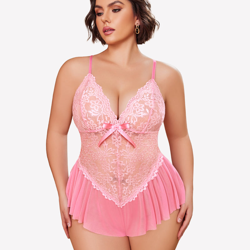 Pink plus size lace bodysuit with adjustable straps and ruffle skirt on model