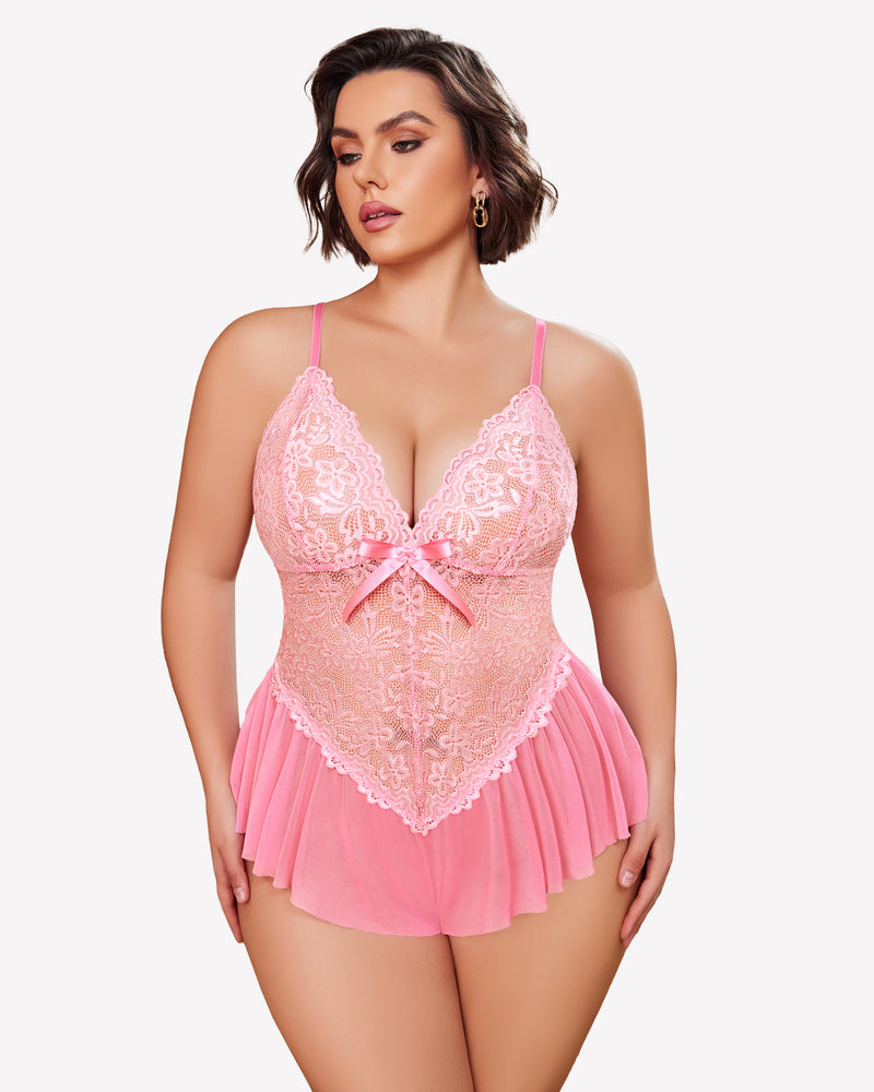Pink plus size lace bodysuit with adjustable straps and ruffle skirt on model