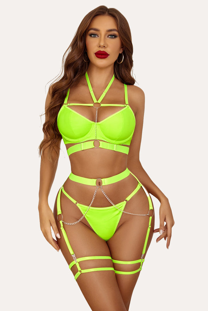 Neon green lingerie set with chain detail, push-up bra and garter belt. For confident wear.