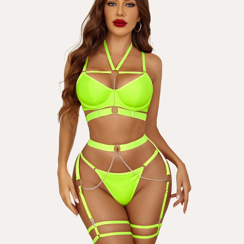Neon green lingerie set with chain detail, push-up bra and garter belt. For confident wear.