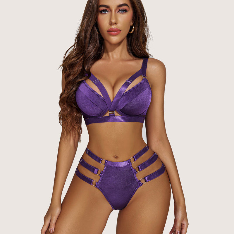 Purple push-up bra and panty set with strappy details. Sexy lingerie for a confident woman.