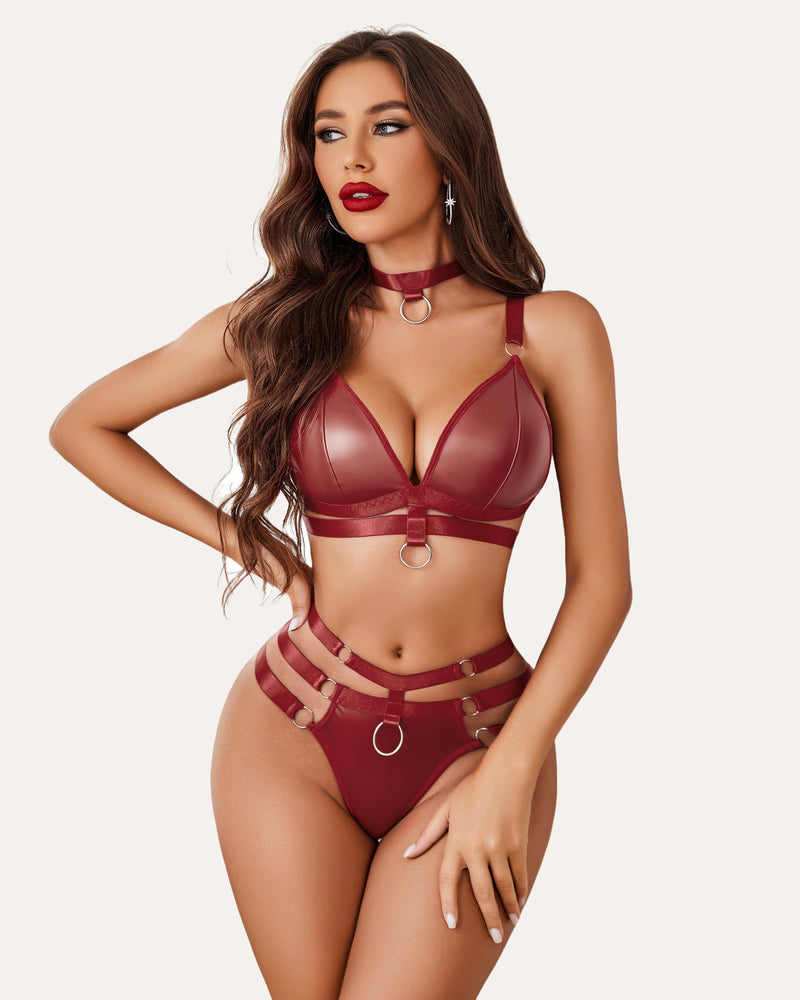 Burgundy O-ring lingerie set: bra, panty, and choker. Edgy design for romance and confidence.