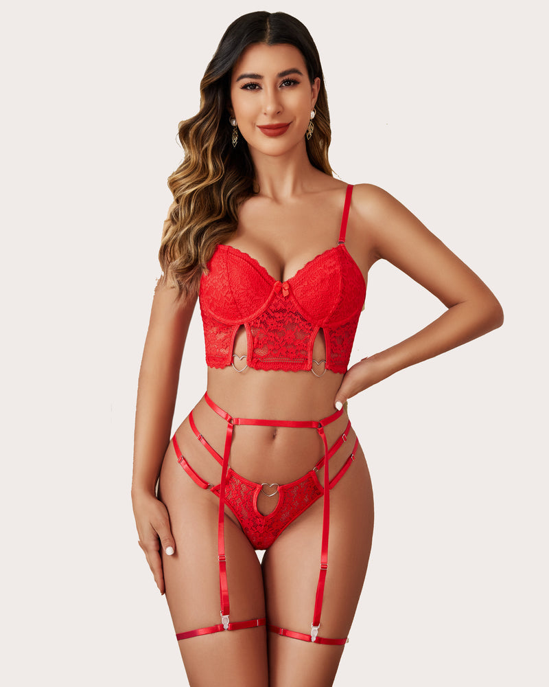Red lace push-up lingerie set with heart details; garter belt and thong. Confident, sexy look.