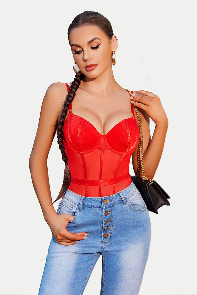 Red underwire bodysuit with mesh patchwork, paired with jeans. Sexy lingerie for women.