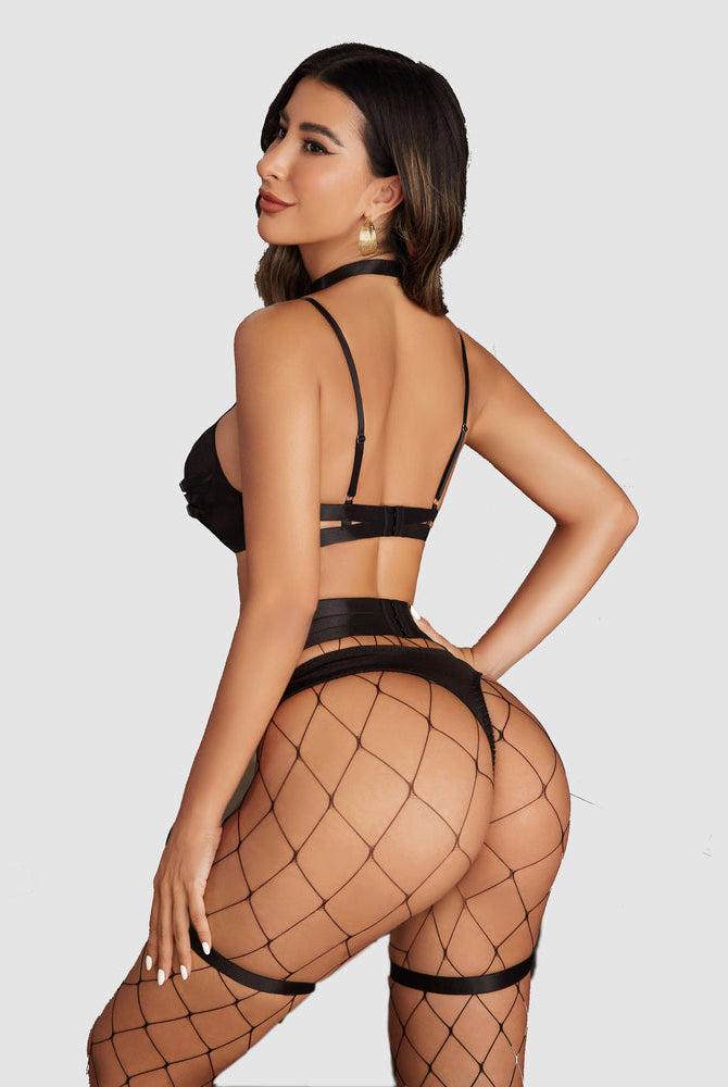 Black push-up lingerie set with cut-out bra, garter belt, thigh bands, and fishnet stockings.