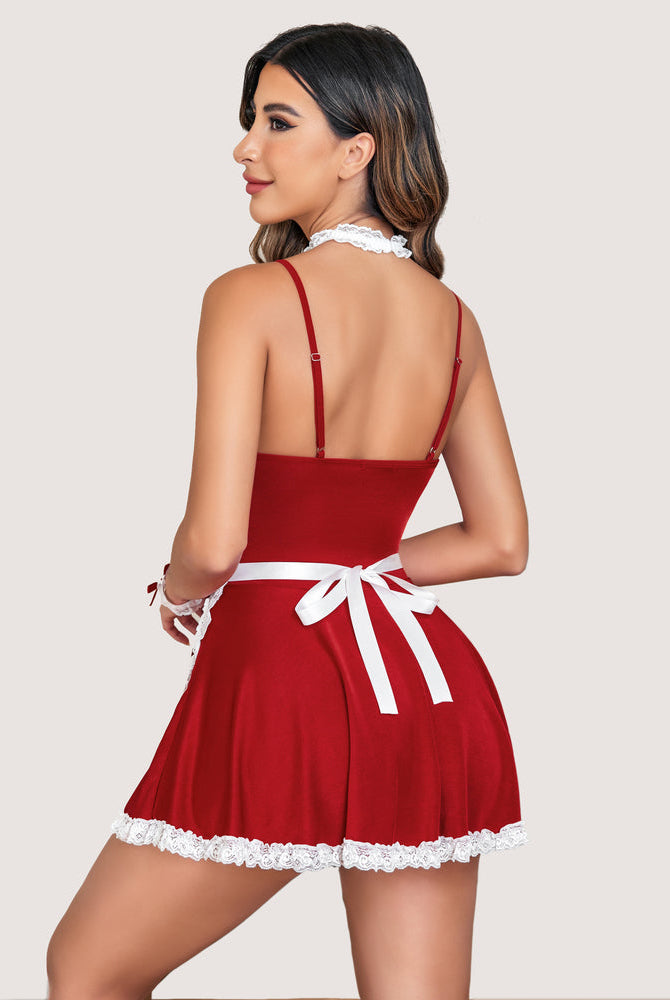 Red maid lingerie dress with white lace trim, choker, apron, and cuffs. Sexy maid costume.