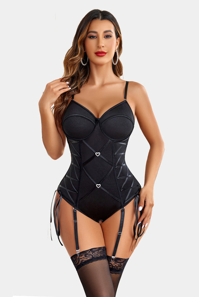 Black corset bodysuit with garter set. Sexy lingerie with adjustable straps and lace stockings.