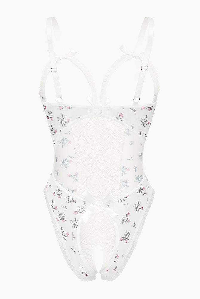 Avidlove white floral lace mini bodysuit with cutout bra, ruffle trim, and crotchless design.