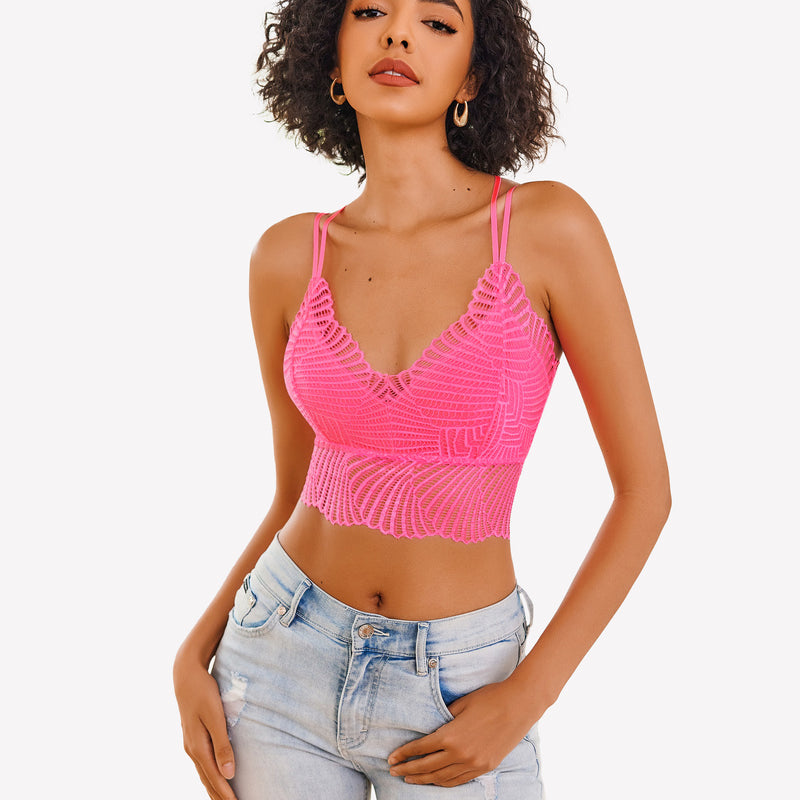 Pink lace V-neck crop top by Avidlove. Adjustable straps and scalloped edge design. Model in jeans.