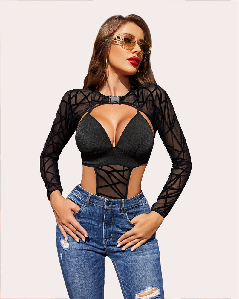 Black mesh shrug bodysuit with ripped jeans. Sexy rave lingerie outfit. Sunglasses say 'QUEEN'.
