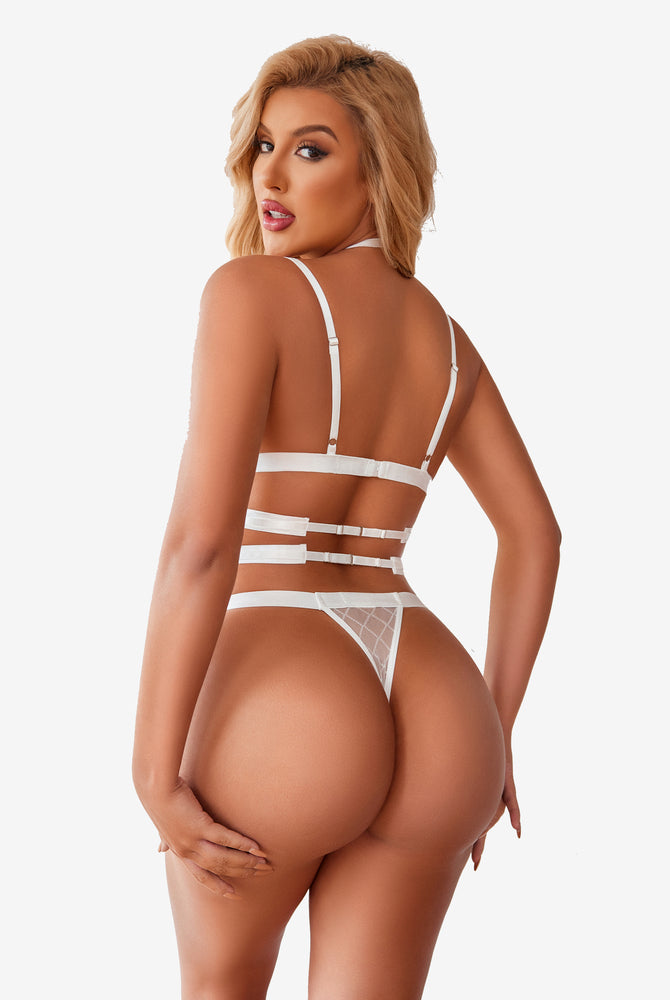 White fishnet halter bra and thong lingerie set with diamond mesh design. Sexy two-piece for women.