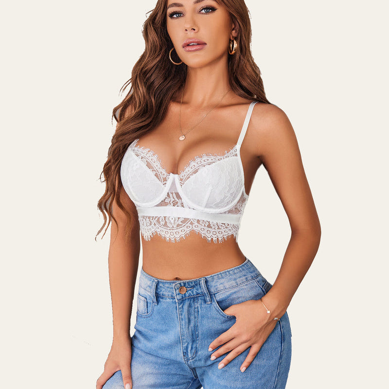 White lace bustier corset cami top, model in jeans, showcasing lace detail and adjustable straps.