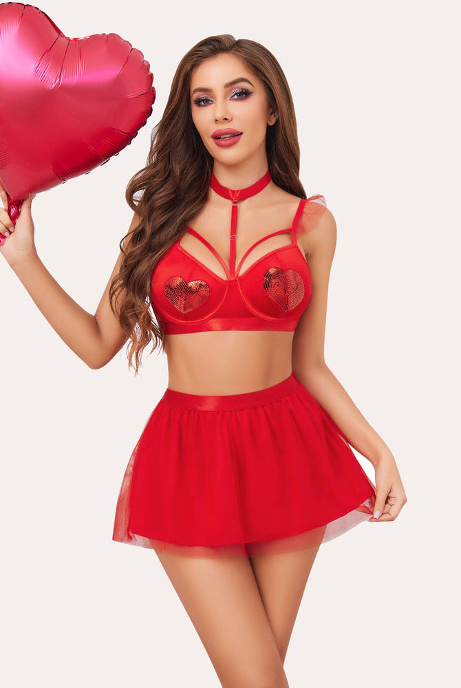 Red heart sequin lingerie set: bra, tutu skirt, choker. Perfect for a confident and sexy look.