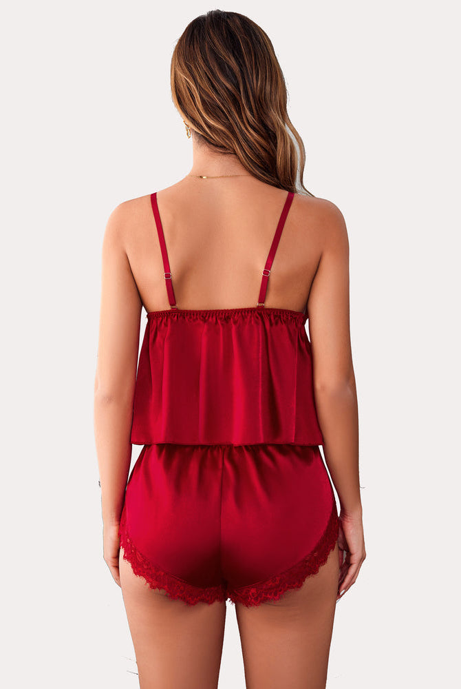 Red satin cami and shorts set. Sexy women's silk pajamas with lace trim for sleep or lounge.