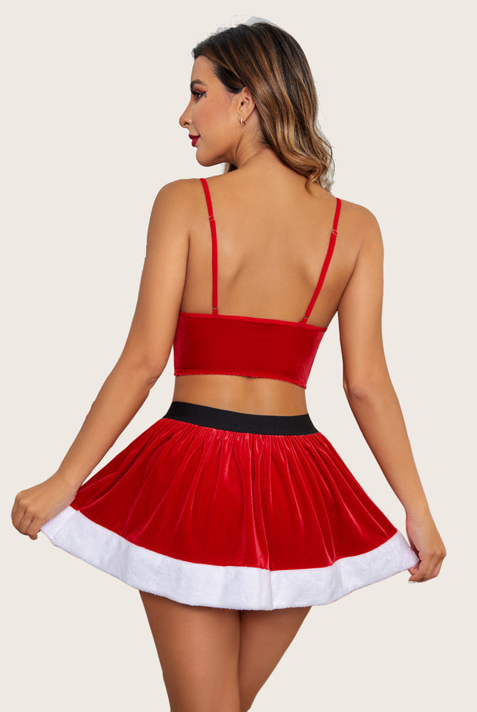 Red velvet Santa costume set for Christmas: camisole and skirt with white fur trim details.