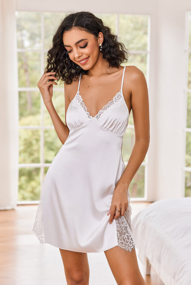 White satin V-neck nightgown with lace trim, adjustable straps, and short slip hem