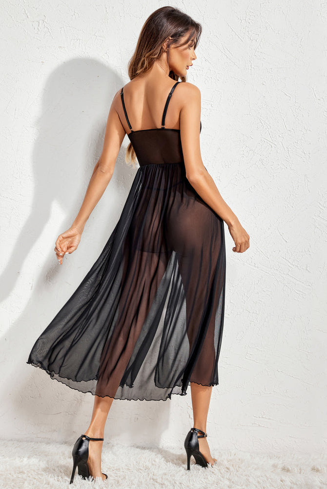 Black sheer Avidlove babydoll nightdress with spaghetti straps, midi length and black high heels.