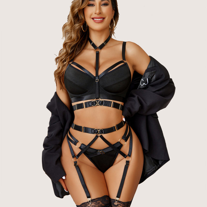 Black lingerie set with push-up bra and strappy garter belt, front view