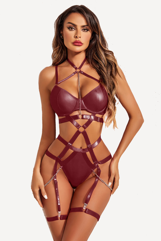 Burgundy lingerie set with chain detail and harness straps for confident and sexy look