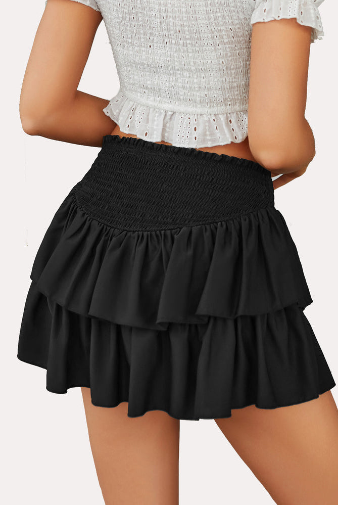 Black ruffle flowy mini skirt with high waist, tiered design, perfect for a sexy and sweet style.