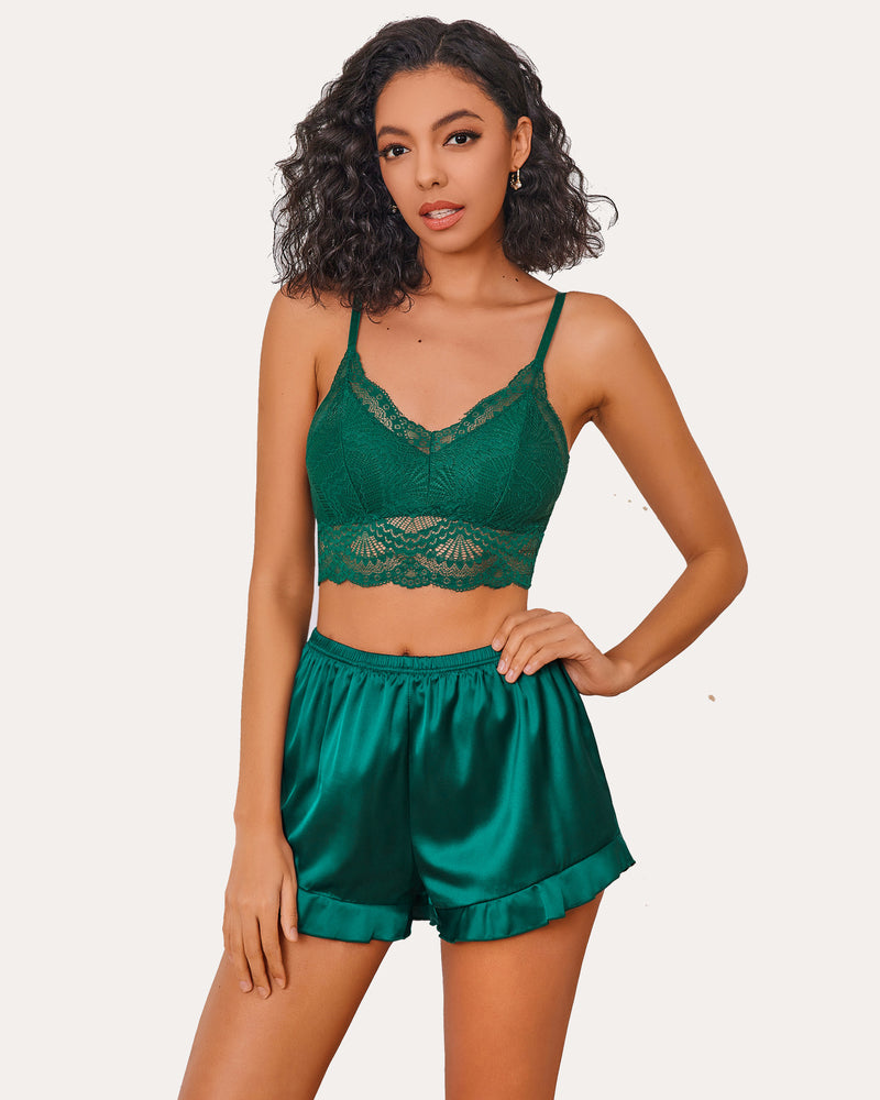 Green lace bralette and silk ruffled shorts pajama set for women. Elegant sleepwear.