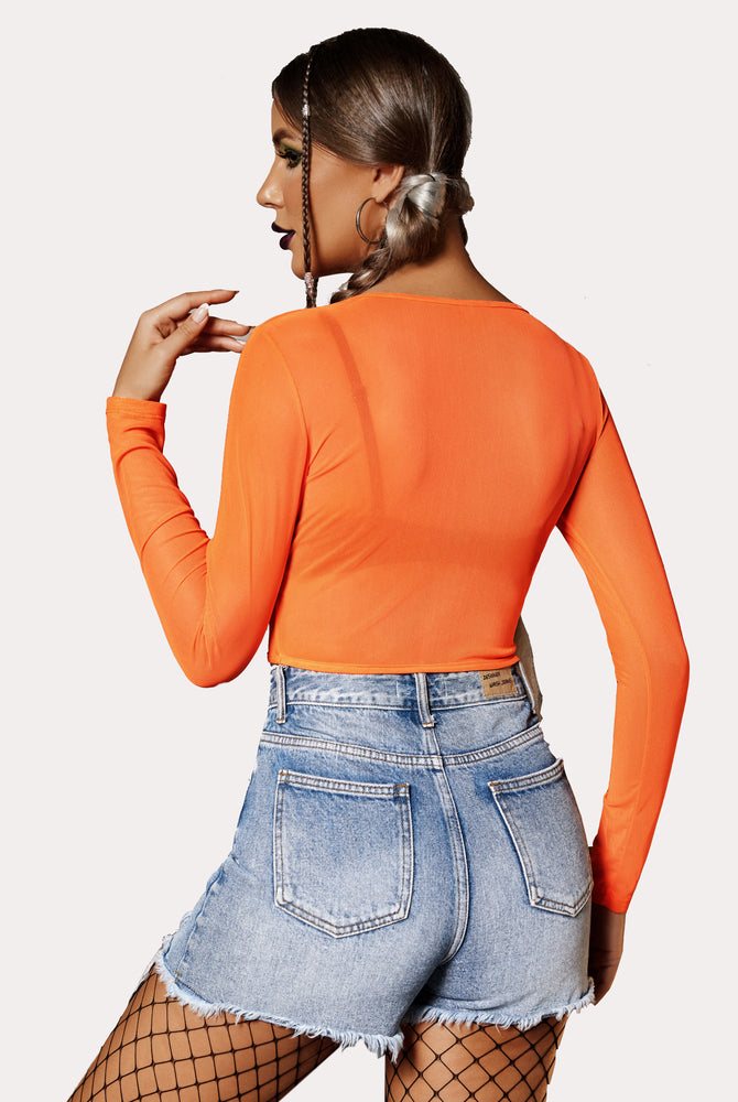 Orange mesh crop top with square neck and denim shorts. Sexy, sheer top.
