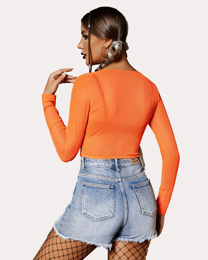 Orange mesh crop top with square neck and denim shorts. Sexy, sheer top.