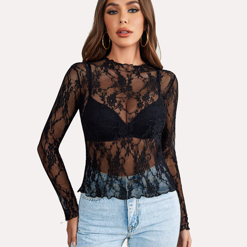 Black floral lace sheer blouse on a woman, mock neck long sleeve, stylish and sexy