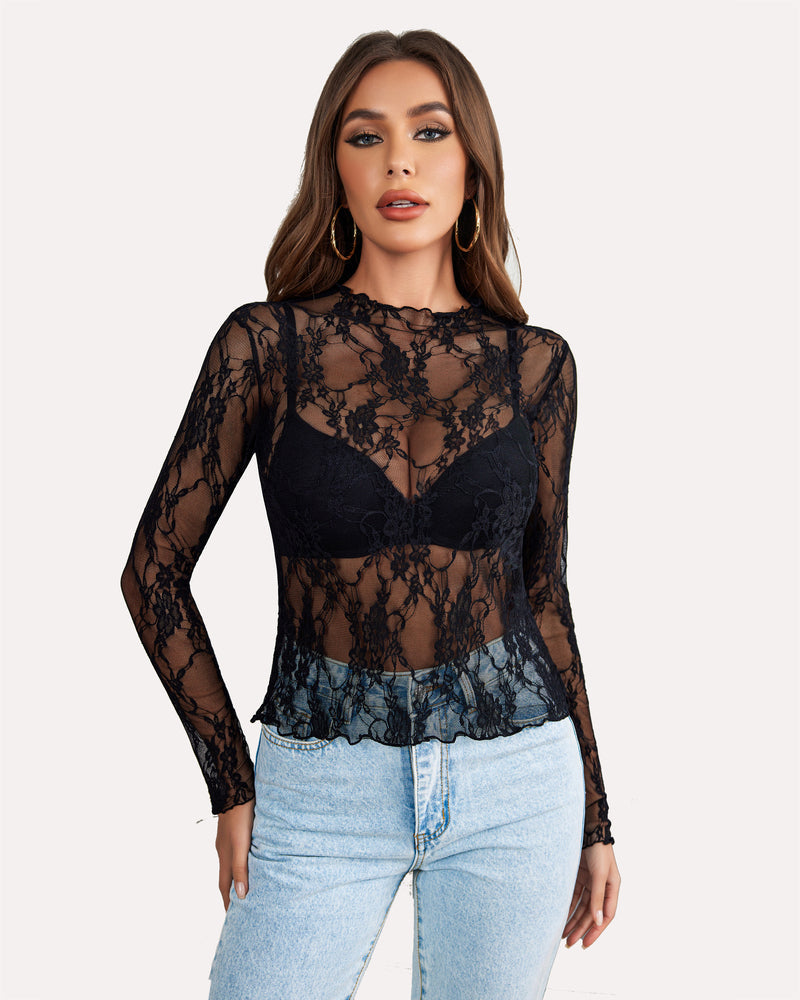 Black floral lace sheer blouse on a woman, mock neck long sleeve, stylish and sexy