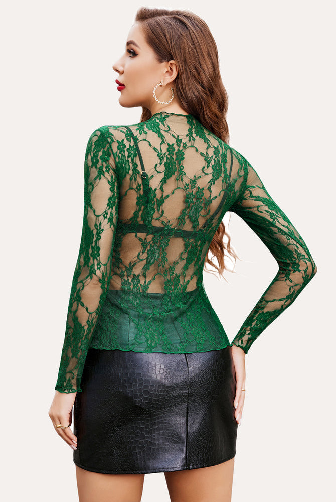 Green floral lace sheer blouse, mock neck, long sleeves, sexy see-through mesh top on a woman