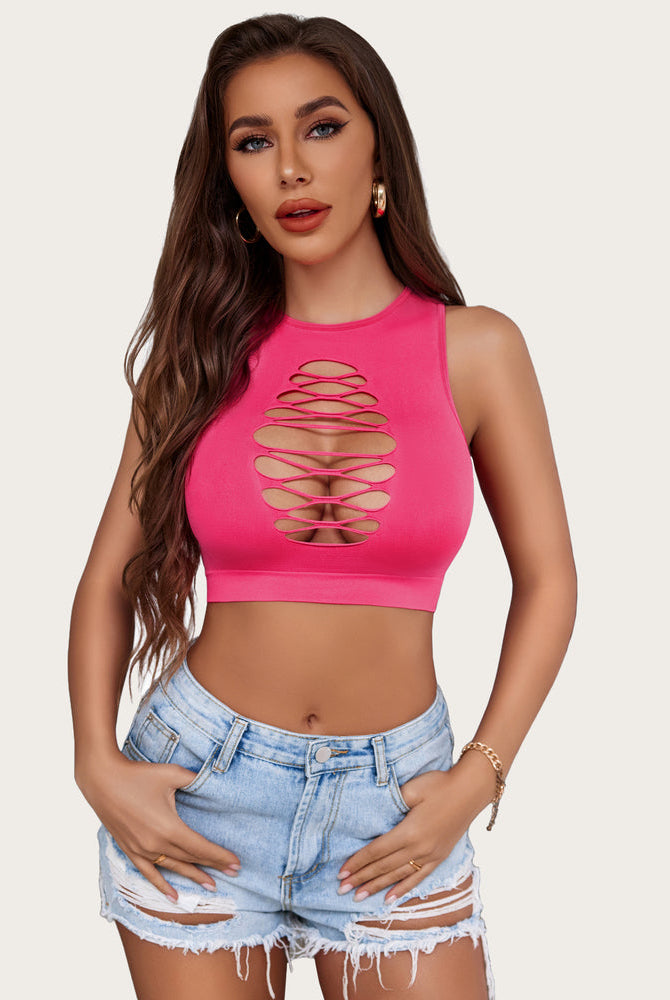Pink cut-out crop top with corset detail. Sexy and fashionable lingerie. Paired with denim shorts.