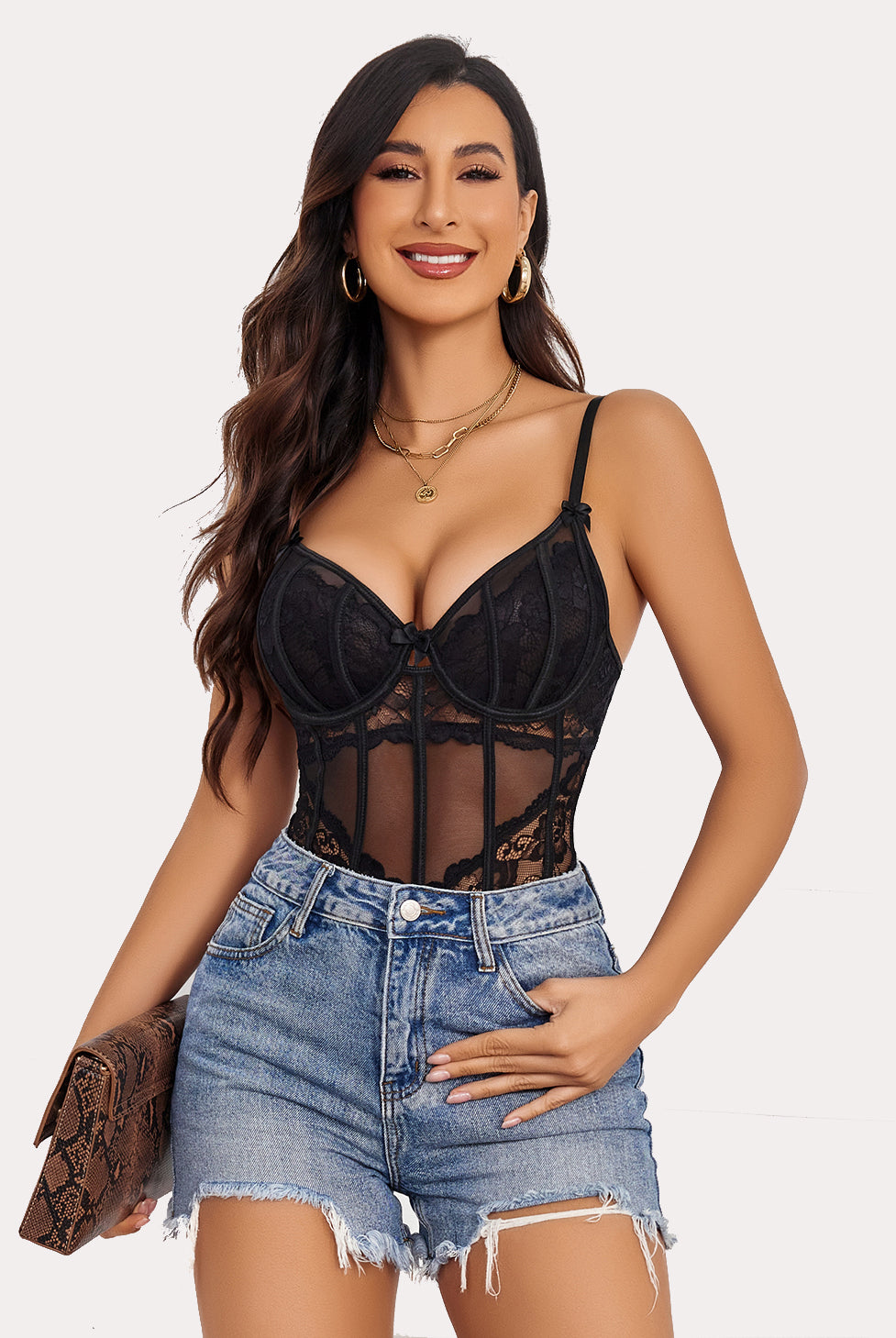 Black lace bodysuit with underwire, cutout V-neck and bow details, perfect for a chic outfit.