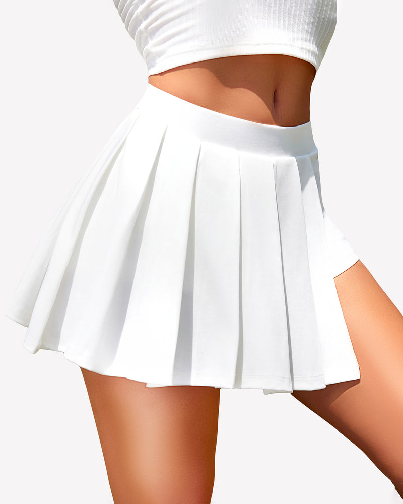 White pleated mini skirt with asymmetrical hem and shorts lining, ideal for daily wear.
