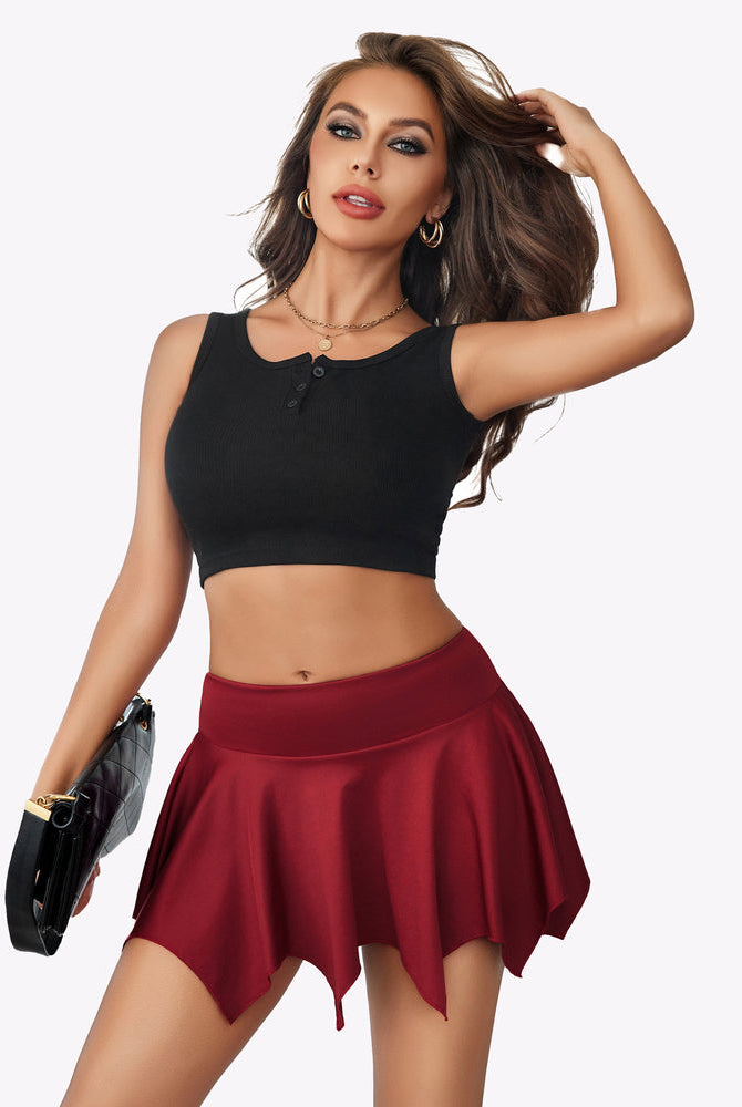 Burgundy A-line mini skirt with irregular cut, stretchy fabric, a stylish choice for casual outfits.