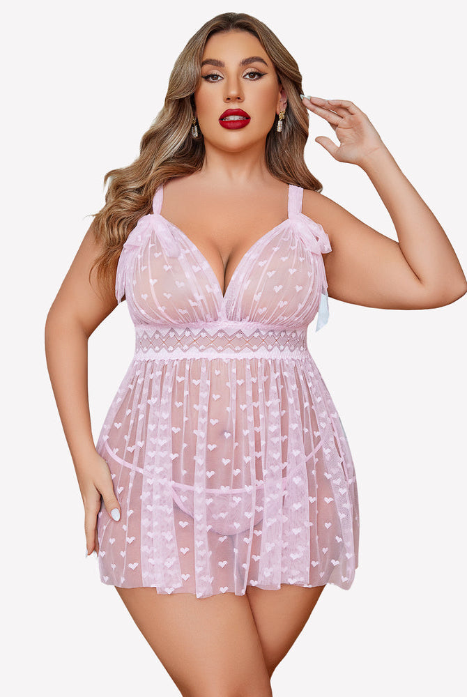 Plus size pink sheer babydoll nightie with heart print and lace detail. Sexy lingerie for women