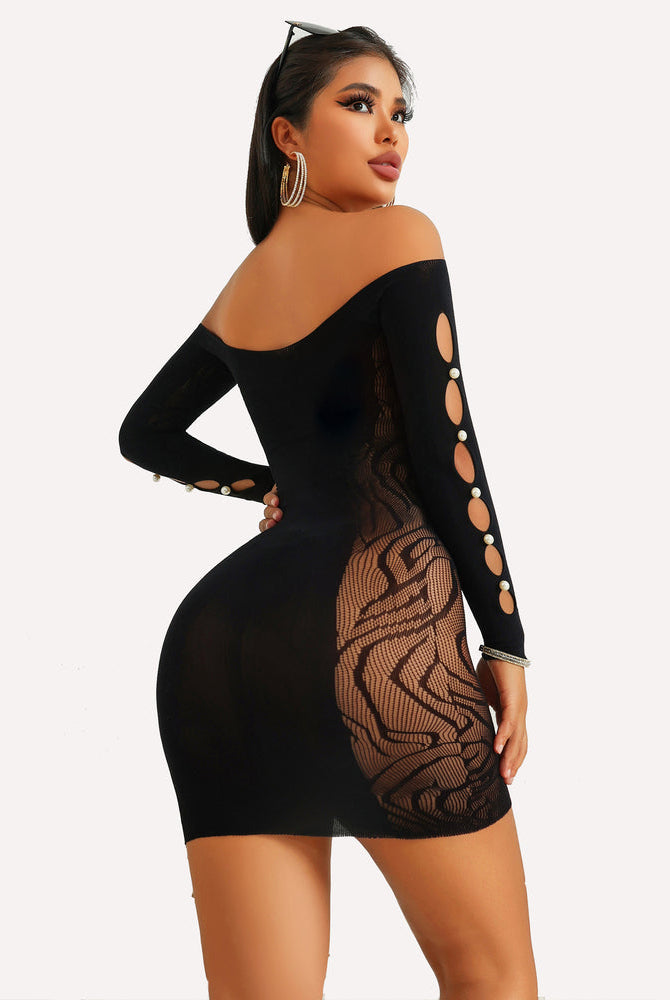 Black fishnet bodycon mini dress with pearl accents, off-shoulder, showing a confident look.