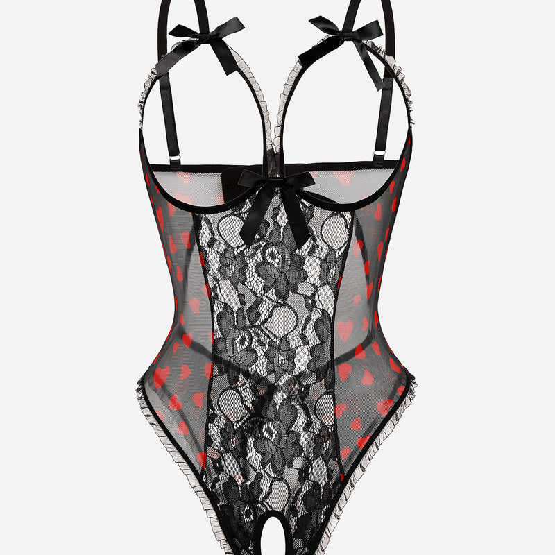 Black lace cut-out bodysuit with heart accents, adjustable straps, and open back. Sexy lingerie.