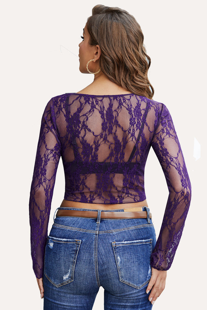Purple floral lace sheer top with bell sleeves and denim jeans. Classy, elegant and sexy style.