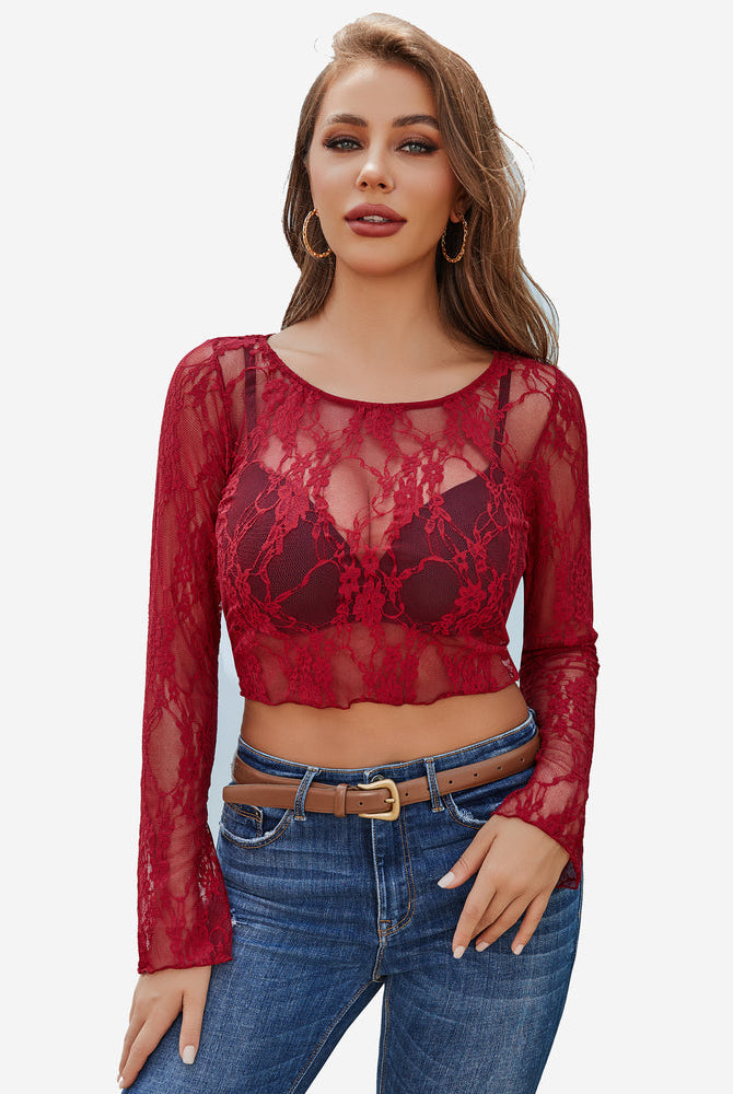 Red floral lace sheer top with bell sleeves and blue jeans. Classy and elegant.
