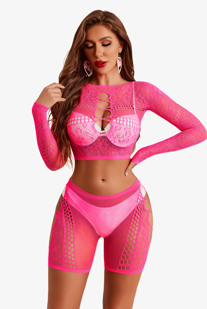 Neon pink fishnet lingerie set, cutout crop top and shorts, sexy and confident style.
