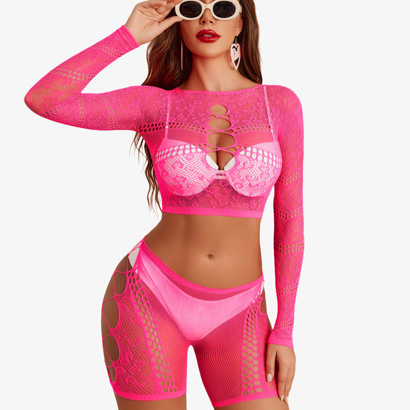 Neon pink fishnet lingerie set, cutout crop top and shorts, designed for a confident, sexy style.