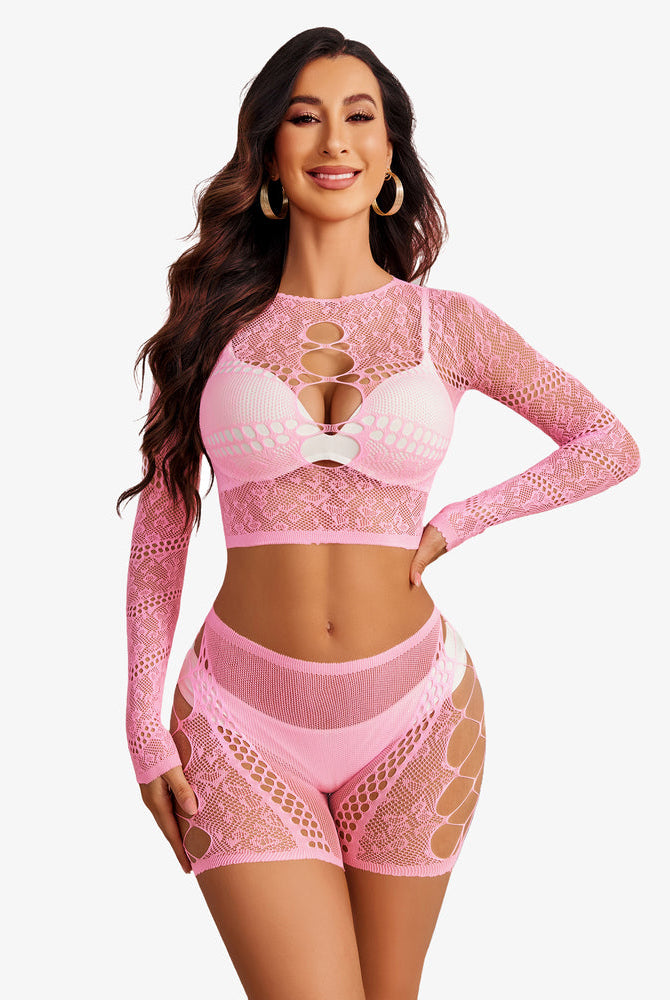 Pink fishnet lingerie set with cutouts, crop top and shorts; stylish, comfortable and confident look