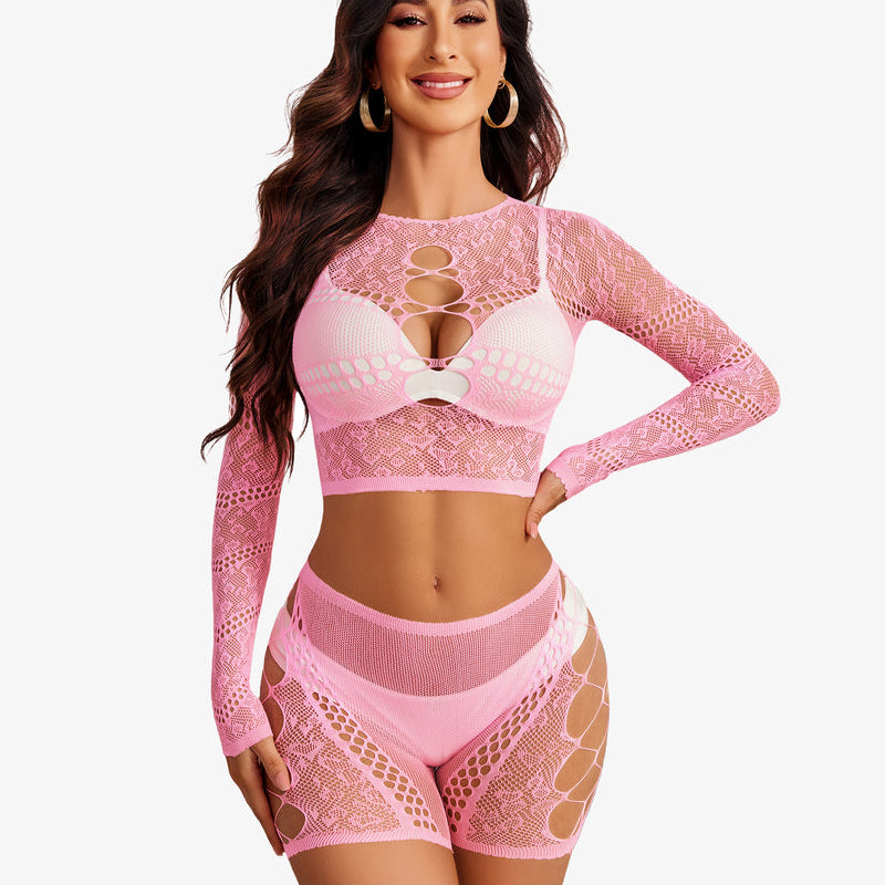 Pink fishnet lingerie set with cutouts, crop top and shorts; stylish, comfortable and confident look