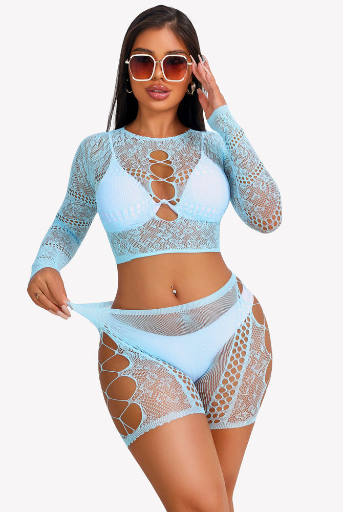 Light blue fishnet lingerie set, cut-out crop top and shorts, sexy and confident style.
