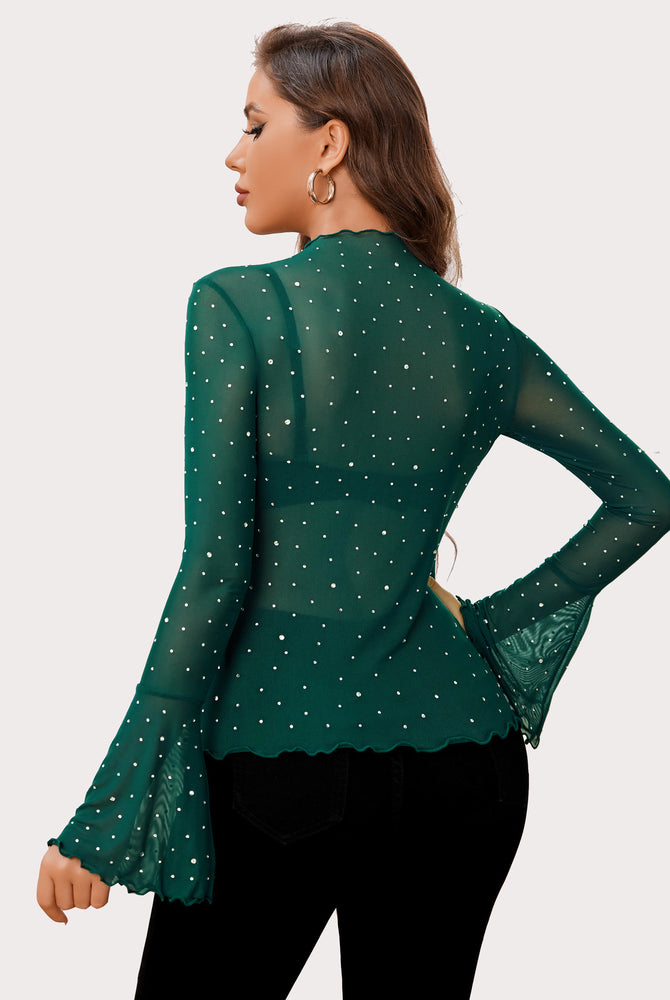 Green mesh rhinestone top with bell sleeves. Sexy lingerie by Avidlove, creating a confident look.