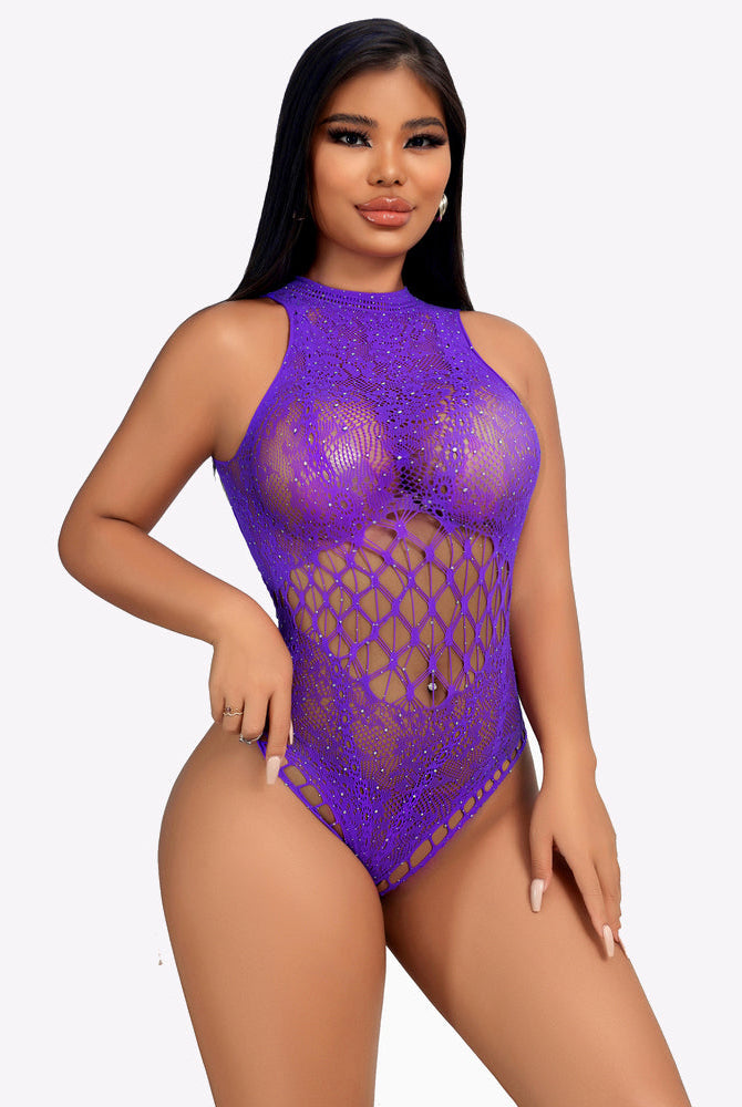 Purple rhinestone fishnet bodysuit with open lattice panels at the torso and hips