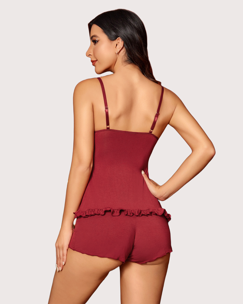Burgundy modal pajama set with ruffled hem. Soft, breathable sleepwear for a comfortable night.