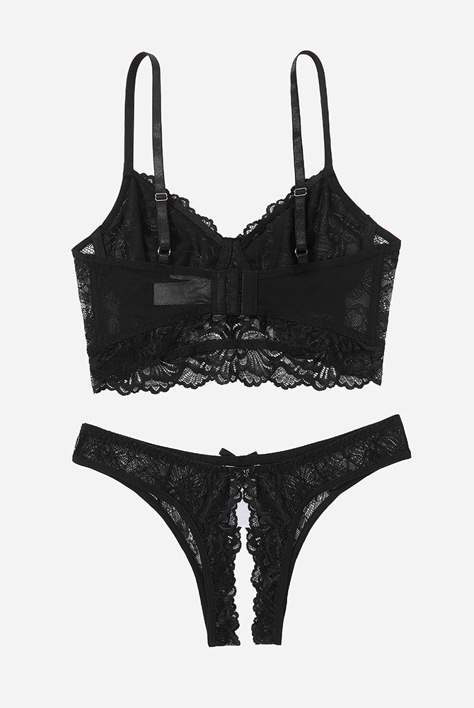 Black lace lingerie set with lace bra and crotchless panty, offering a flattering and sexy look.