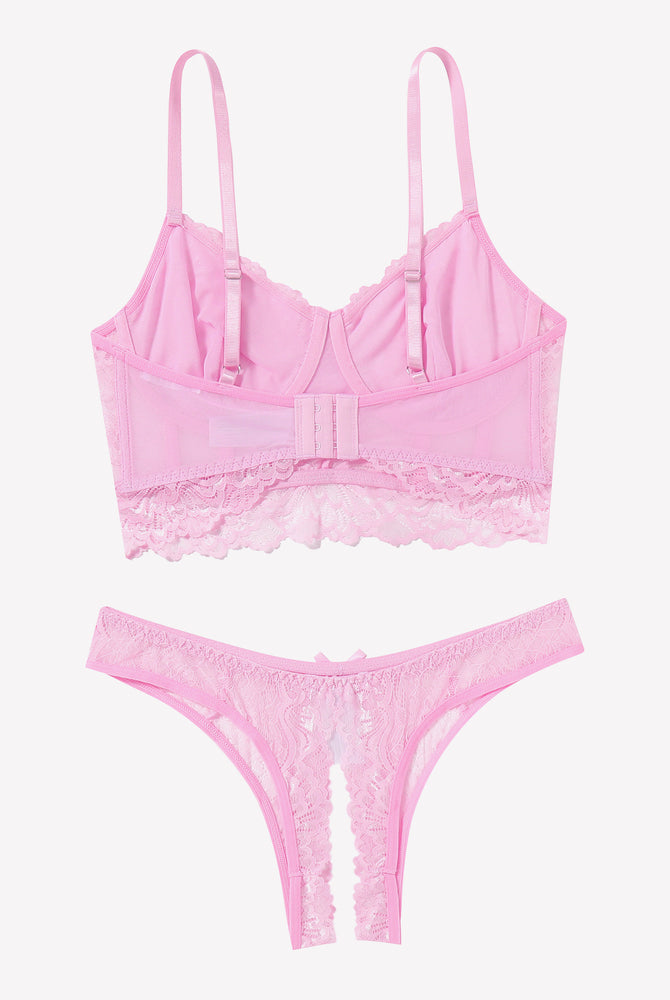 Pink lace bra and crotchless panty set. Adjustable straps, flattering design, sexy lingerie.